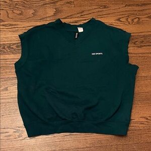 Ladies Green Sweashirt Vest.